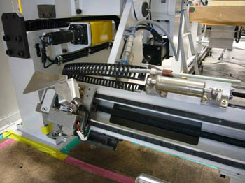 トラバースカッタと帯電装置